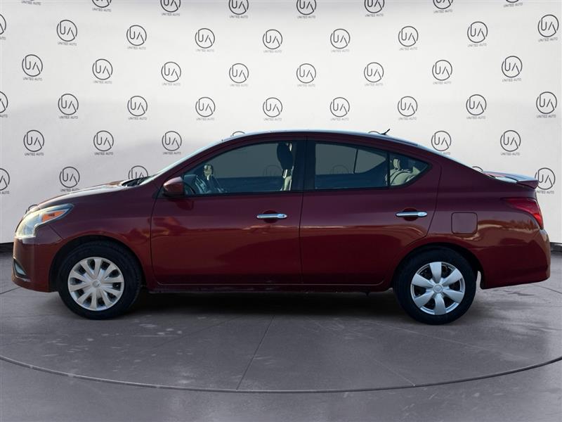 2016 Nissan Versa Plus SL SV photo 2